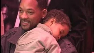 WILL SMITH brings sleeping toddler JADEN to play opening