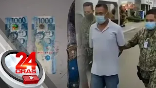 Lalaking bumili sa mga tindahan gamit ang pekeng pera, timbog; isa pang kasabwat, nakatakas | 24Oras