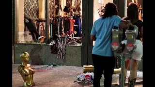 Community helps clean up black-owned Dallas boutique after burglarized, damaged by looters