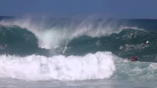 Big wave surfing at Pipeline, North Shore Oahu