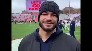 Roman reigns first appearance after leukemia to watch  collegiate football