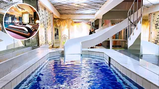 Staying at a Japanese love hotel with an amazing water slide.|Hotel Charmant