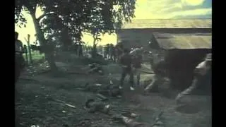 Filipino guerillas attacking japanese camp garison (The Steel Claw (1961) )
