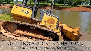 Got the dozer stuck trying to clean up the edges of the pond