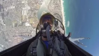 RAAF F/A-18F Super Hornet cockpit view over Gold Coast during high speed pass.