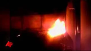 Amateur Video Shows Bin Laden Home in Flames