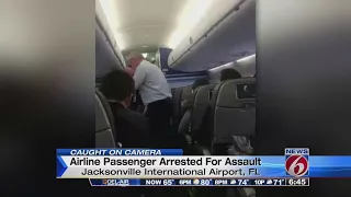 Passenger accused of assaulting 2 flight attendants