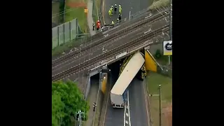 New footage shows truck slamming into Brisbane rail bridge