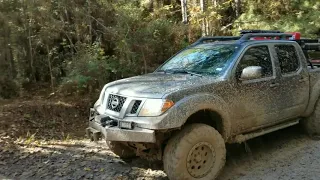 Mudding in a frontier and jeep at general sams off road park