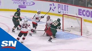 Calen Addison Scores First NHL Goal After Puck Takes Weird Bounce & Drops Into Net