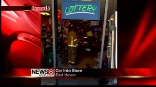 Car drives through liquor store