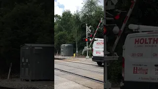 Van Runs Railroad Crossing Gates, Train Coming On Blind Curve!  JawTooth #shorts #train #railway