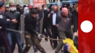 Ukraine violence: Pro-Russian militants clash with unity march in Donetsk