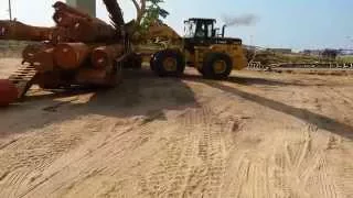 Unloading the Oshkosh M1070 HET under the bridge