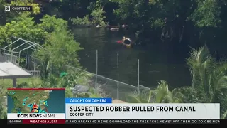 Robbery suspect pulled from canal