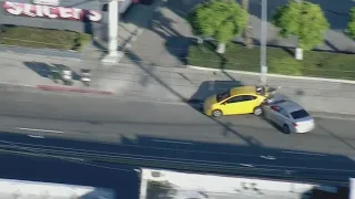 LAPD pursuit ends in collision with parked car