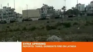 Tanks and gunboats 'fire on Latakia'