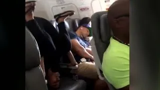 Passenger does headstand on plane