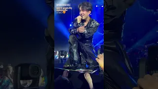 Dimash holding a dear's hand while singing give me love