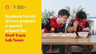 Watch Charles Leclerc & Carlos Sainz Prepare Gingerbreads for the Shell Track Lab Team