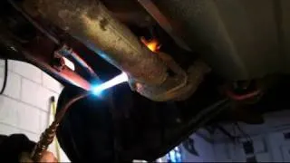 Using a Torch to Remove a Rusty Muffler Part 1 - EricTheCarGuy