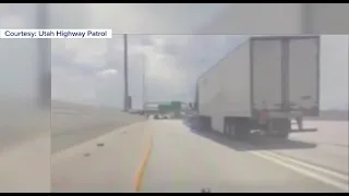 Dashcam video captures car hit by semi-truck on I-15