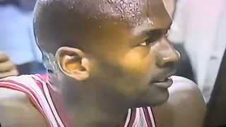 Michael Jordan blocks the shot of Eddie Johnson but gets called for a foul by Hue Hollins. (1996)