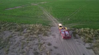 hauling 3x3 bales new holland bale wagon mil-stak