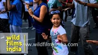 Cute young girl dances fast, catchy and rhythmic Zumba