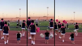 Adorable Two-Year-Old Boy Shows Off Cheerleading Skills With Sister's Squad