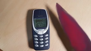 EXPERIMENT Glowing 1000 Degree KNIFE Vs NOKIA 3310