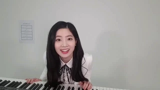 TWICE's Dahyun playing piano