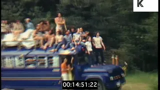 1960s, 1970s USA, Hippies Riding Top of Hippie Bus