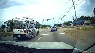 Insane video. Oblivious idiot in a Versa tries to cause accident.