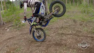 As many dirt bike tricks as possible on one log!