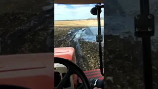 Quadtrac Stuck In Mud Backing Out