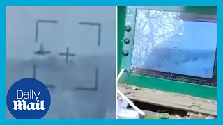 Ukrainian soldiers react to shooting down Russian helicopter