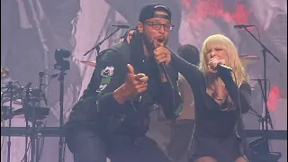 Stephen Curry performing “Misery Business” with Paramore on stage at the Chase Center