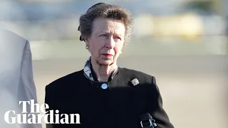 Princess Anne looks on as Queen's coffin transferred to plane en route to London