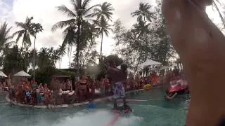 James show flyboard with a professionnal dancer girl in the pool of Nikky Beach Koh samui