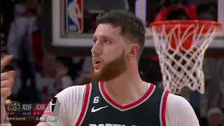 Jusuf Nurkic tries to back down his old teammate Nikola Jokic in the post as Jokic finesses an offen