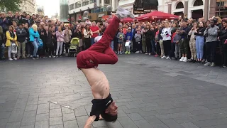 Street performer in London, Leicester Square. Breakdancing and acrobatics by Jeremie Houet.