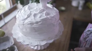 A Baker Applying Icing On A Cake 4K