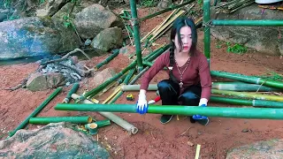 The girl built a bamboo house and fished in the stream