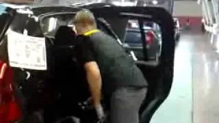 Worker makes final tweaks to the doors of new Dacia