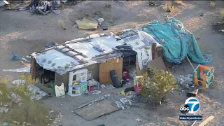 Joshua Tree couple arrested after 3 kids found living in box for years I ABC7