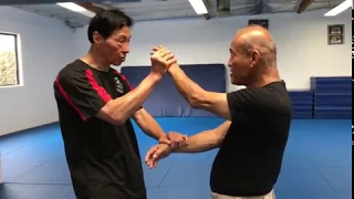Samuel Kwok and Dan Inosanto friendly exchange on Wing Chun.