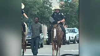 VIDEO: Mounted police cuff man with rope