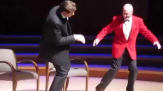 John Travolta dancing on stage at CITY Gala 2017 with Greg Reid