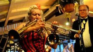 Gunhild Carling plays three trumpets at the same time
